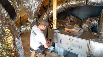 HVAC service expert completing a repair in Raleigh